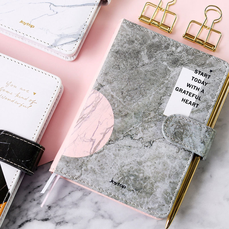 Kodėl 2024 m. stalus perima akmens popieriniai užrašų knygelės?